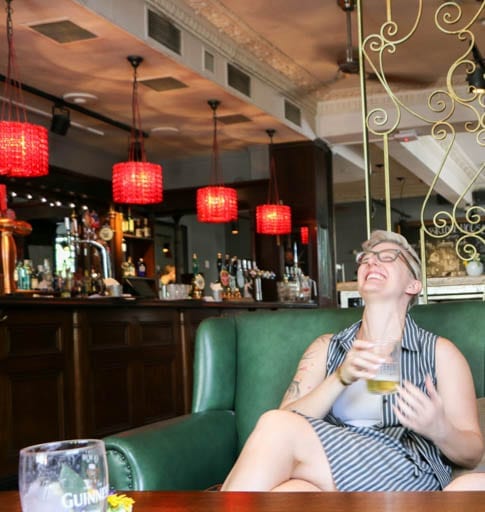 Laughing over a beer during a canal walk in London