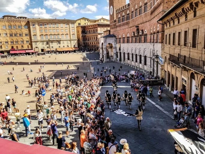 Piazza del Campo with a contrada parade