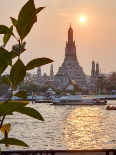 Temple of Dawn, Wat Arun, at sunset in Bangkok.