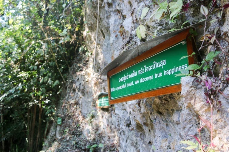 With a peaceful heart we discover true happiness. A sign at Wat Tham Pha Plong in Chiang Dao.