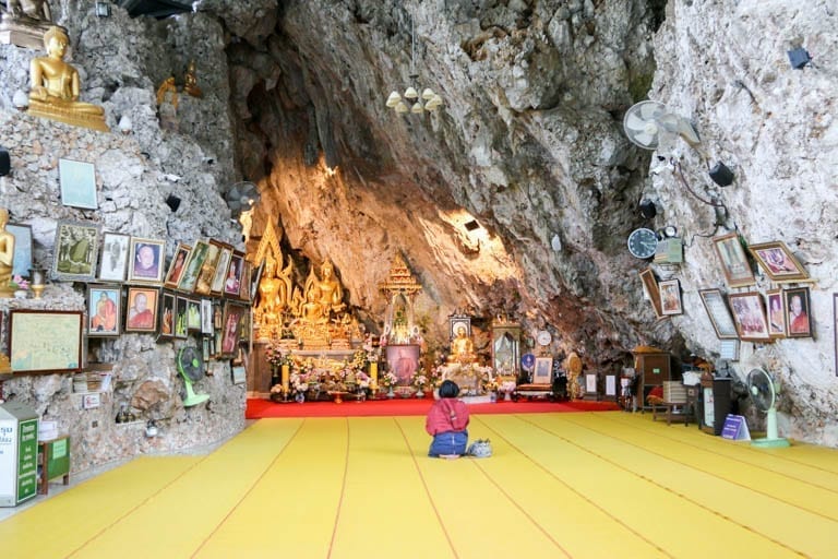 A person meditates at Wat Tham Pha Plong in Chiang Dao