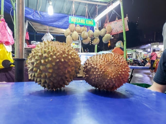 The durian fruit is the king of fruit in southeast asia. Learn how to eat it on this malaysian street food tour!