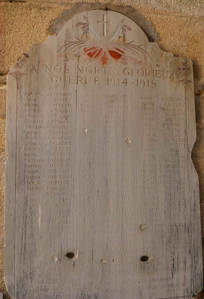 bullet holes in a WWI memorial in the martyr village of France. It's a sad reminder of what happened at Oradour-sur-Glane.