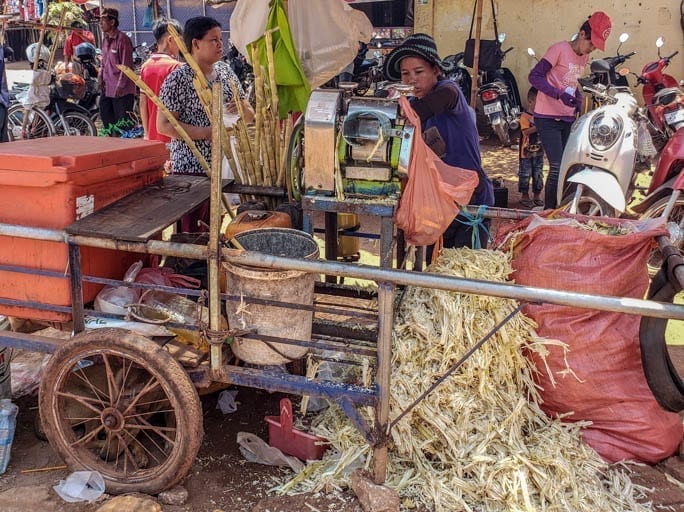 Sugar Cane stalks become juice in Siem Reap