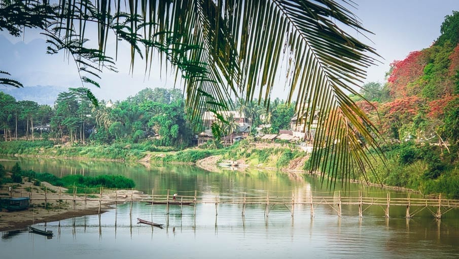 The Mekong River in Luang Prabang where releasing fish into the water for a chance at a second life is a ritual way of making a wish in Southeast Asia.