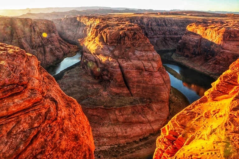 Horseshoe Bend is a perfect stop on a road trip along the Utah and Arizona border