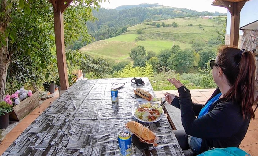 A woman eats lunch with a view in spain