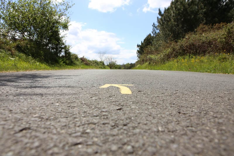 a yellow arrow on the camino de santiago 