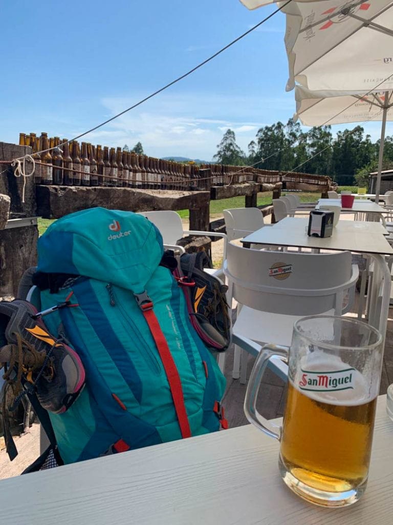 Backpack on the Camino del Norte with beer