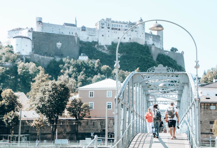 Crossing the Salzach River on a walking tour of Salzburg