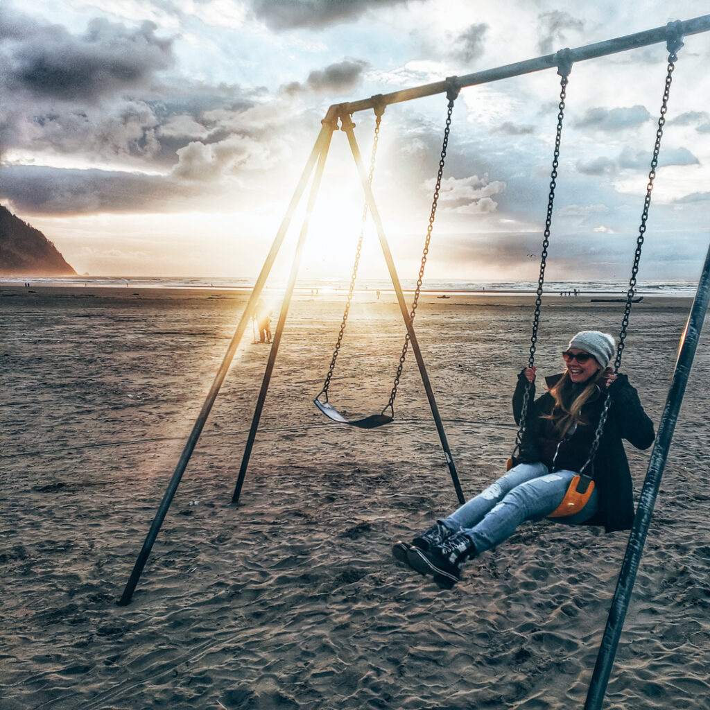 The swings at Seaside, Oregon are a fun stop on an Oregon Coast road trip.