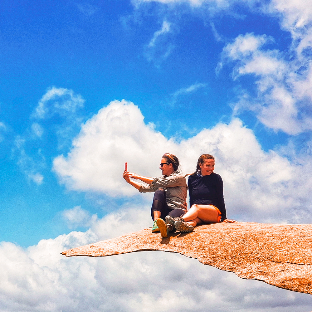 Sitting on Potato Chip Rock