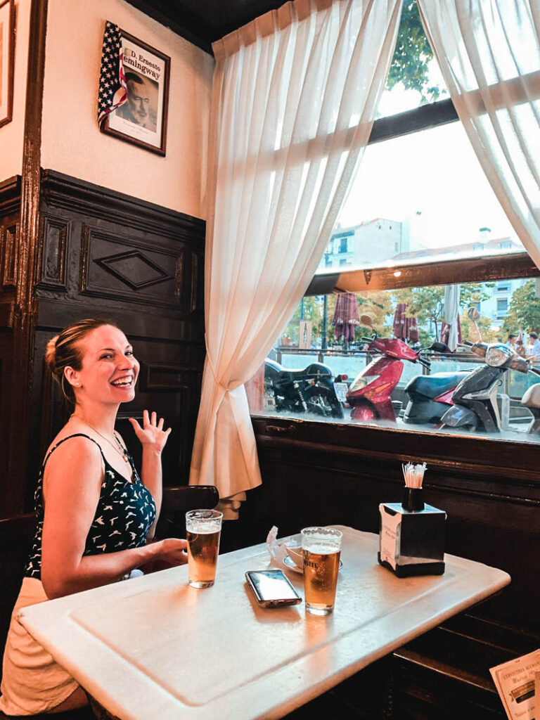 Hemingway's table at La Alemana in Madrid. His picture hangs on the wall behind his corner table. A must-stop on a tour of Hemingway's Madrid.