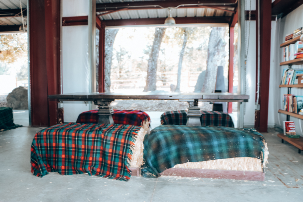 Hay bales for seats in the barn at Calico Cidery in the Ramona Valley Wine Region