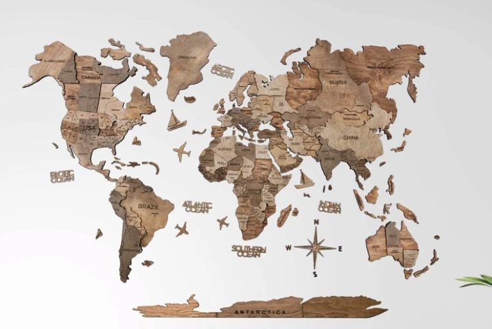 a wooden world map belongs on the wall of every travelers home. the perfect green gift for the travel lover!